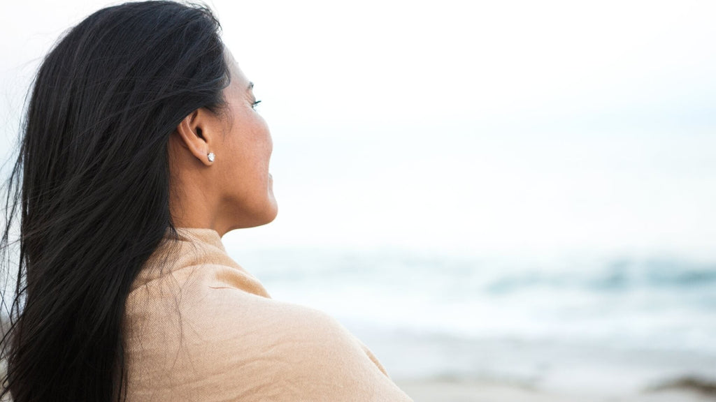woman looking out to sea