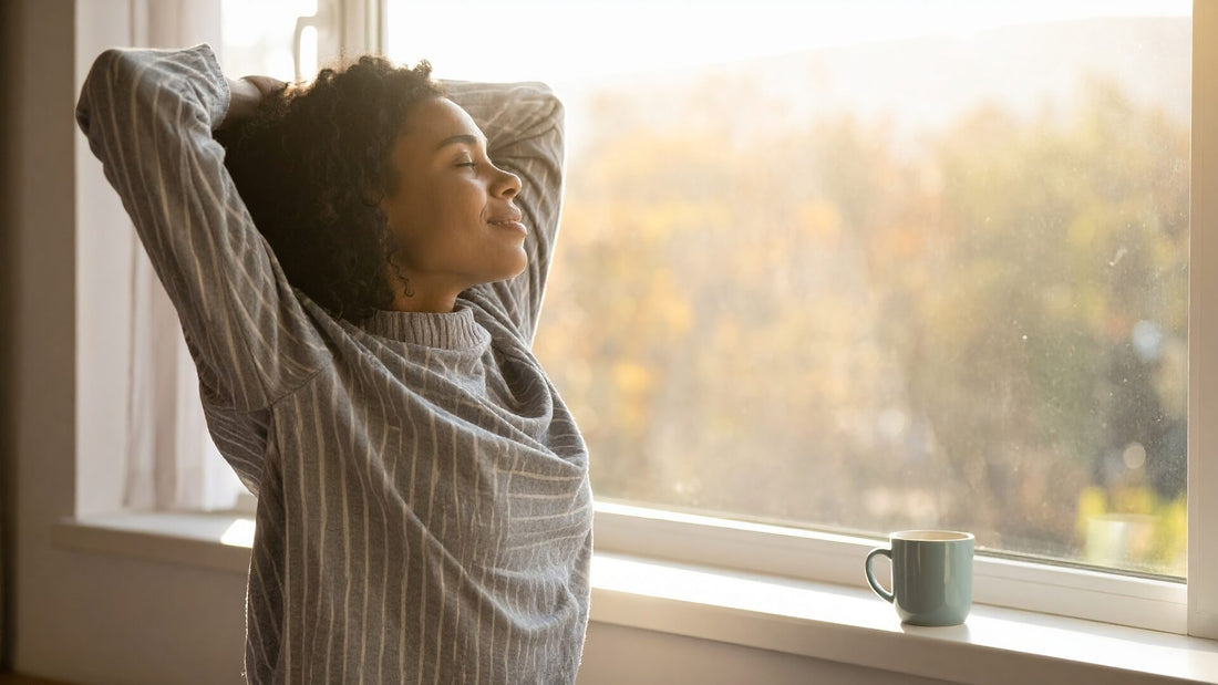 woman embracing winter sunlight