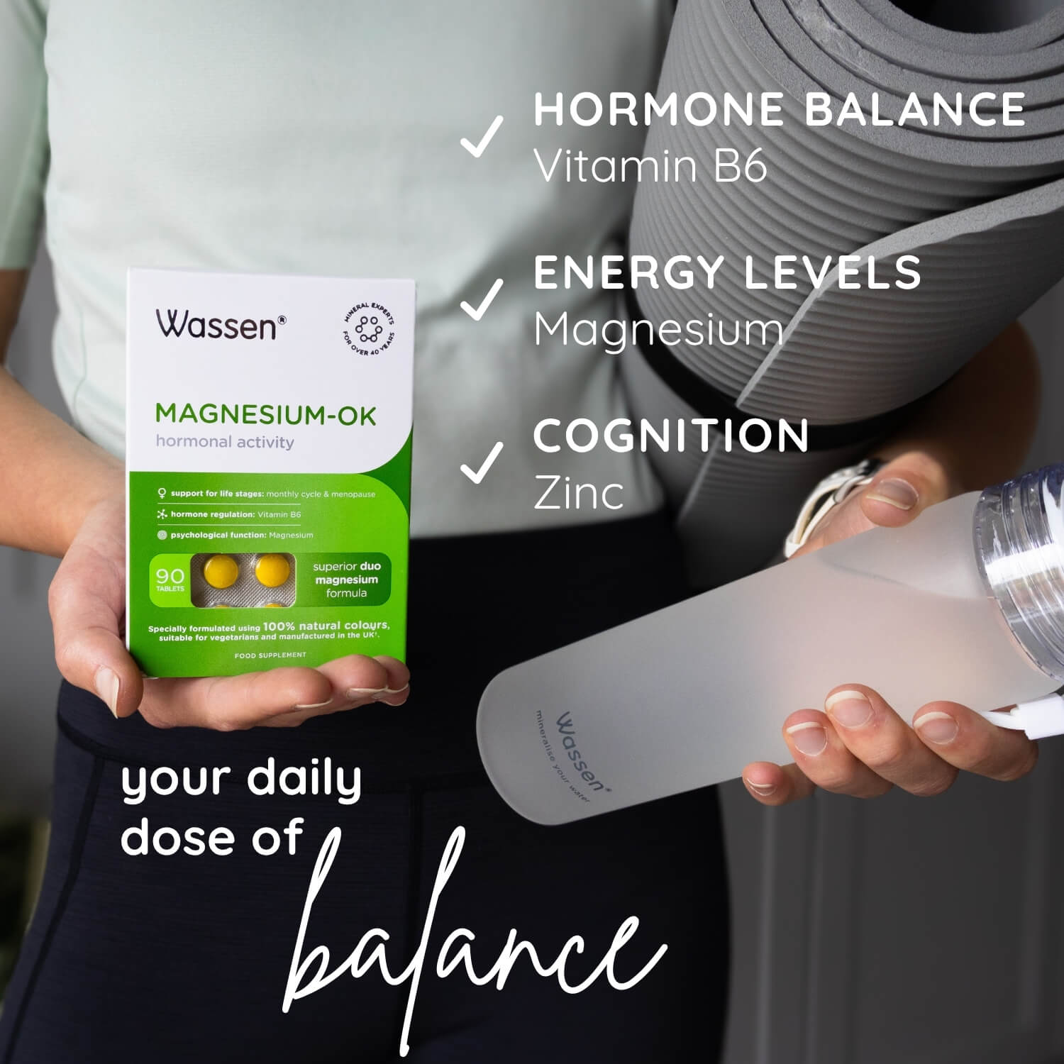 Person holding a Wassen magnesium-ok supplement with text about hormone balance, energy levels, and cognition.