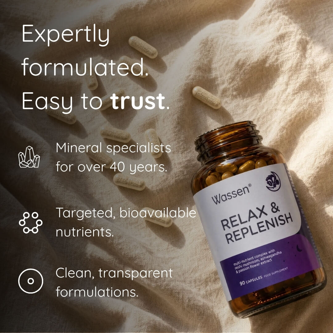 An amber supplement bottle labeled 'Wassen Relax & Replenish' placed on a beige fabric background with scattered capsules. Large marketing text appears on the left, including 'Expertly formulated.